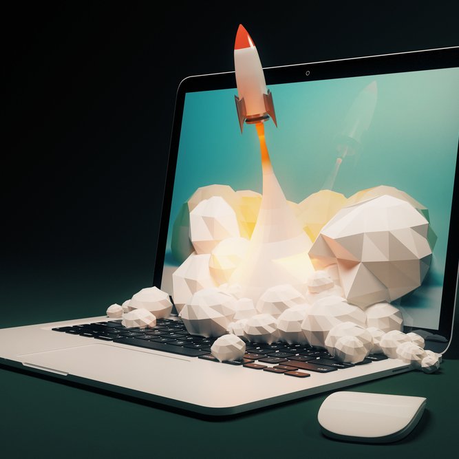 Startup,Concept,With,Rocket,Flying,Out,Of,Laptop,Screen,On